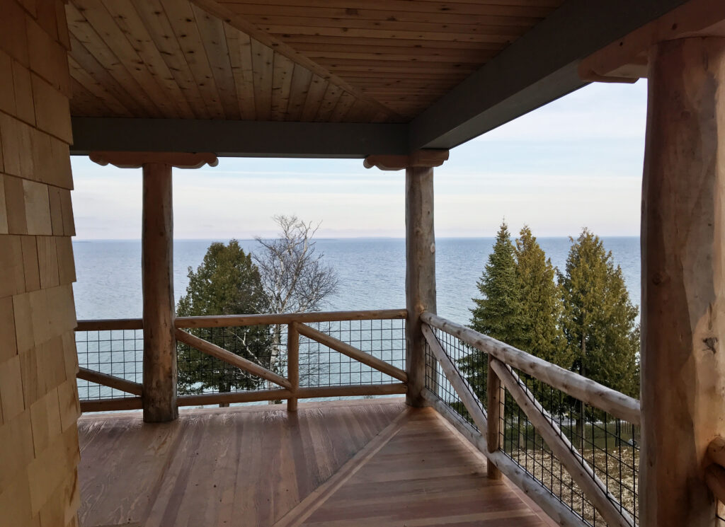 view of lake from under the porch/ balcony