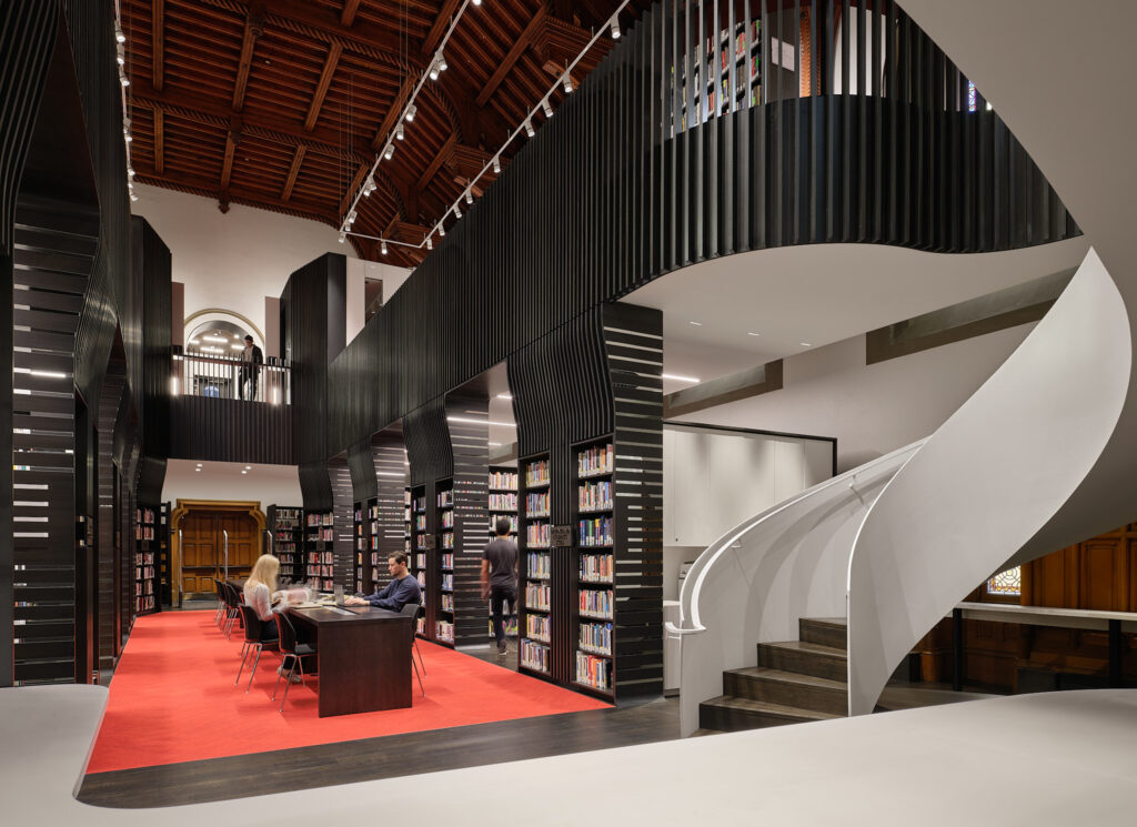 Interior of University College Library with view of curving stair \case