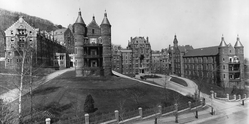 Royal Victoria Hospital, circa 1917, showing the entry procession and multiple buildings up the incline of Mount Royal.