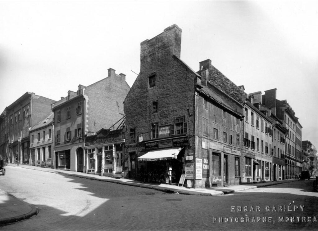 archival photo of historic stone buildings